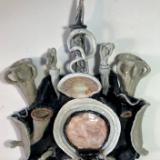 18" tall, gray wall sculpture